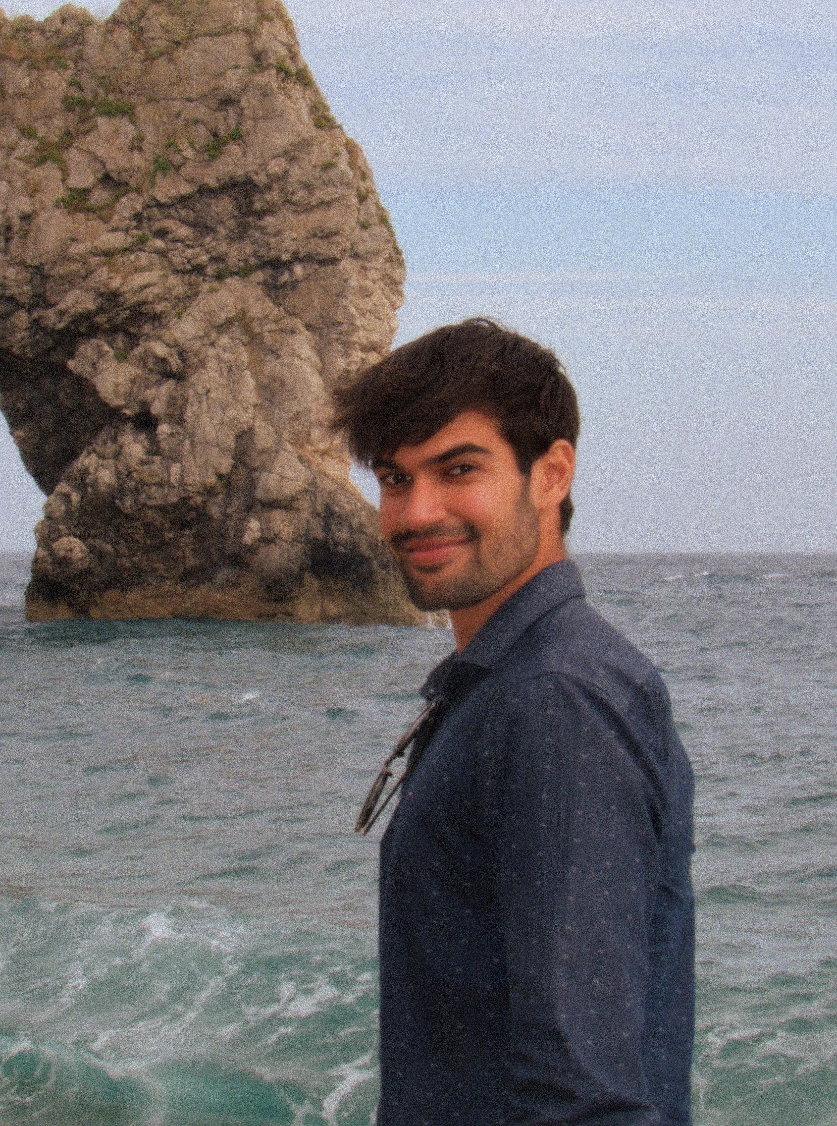 Portrait of Vedeesh Bali at Durdle Door in Dorset, United Kingdom.